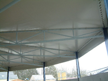 fabrication de b�ches sur mesure pour couverture des murs d'un man�ge