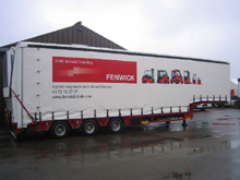 Confection sur mesure de b�ches de camion semi remorque Faymonville et impression de photos.