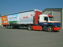 B�ches coulissantes pour semi-remorque Knauf avec impression photo et vernis de protection sp�cial transport.