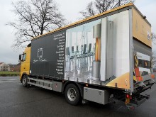 camion avec b�ches full impim�es - Actuel service - po�le � bois cera et jid� design